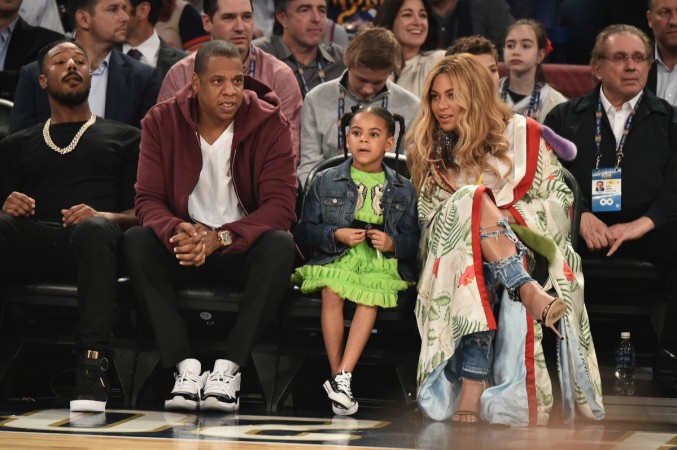 (L-R) Michael B. Jordan, Jay Z, Blue Ivy Carter and Beyoncé Knowles attend the 66th NBA All-Star Game at Smoothie King Center on February 19, 2017 in New Orleans, Louisiana. Michael B. Jordan, Jay Z, Blue Ivy Carter and Beyoncé Knowles