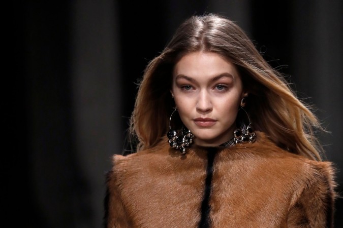 US model Gigi Hadid presents a creation by Isabel Marant during the 2018/2019 fall/winter collection fashion show on March 1, 2018 in Paris Gigi Hadid