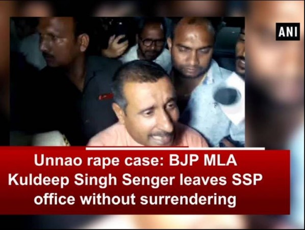 BJP MLA Kuldeep Sengar speaks to media personnel outside SSP office unnao