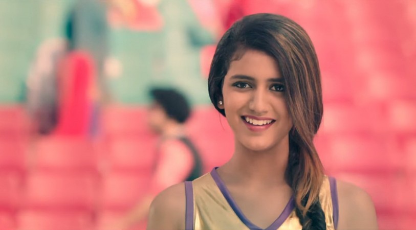   Priya Prakash Varrier "title =" Priya Prakash Varrier "width =" 660 "height =" auto "tw =" 1105 "e =" 611 "/> 

<figcaption clbad=