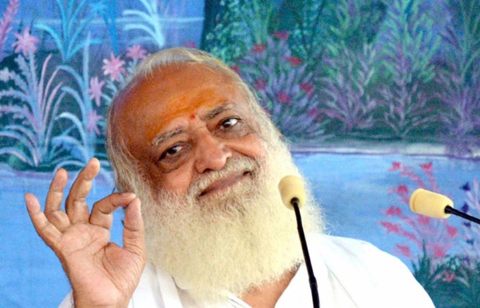 This photograph taken on August 11, 2013, shows self-styled Indian 'godman' Asaram Bapu as he gestures during a ceremony in Jodhpur. self-styled godman Asaram Bapu