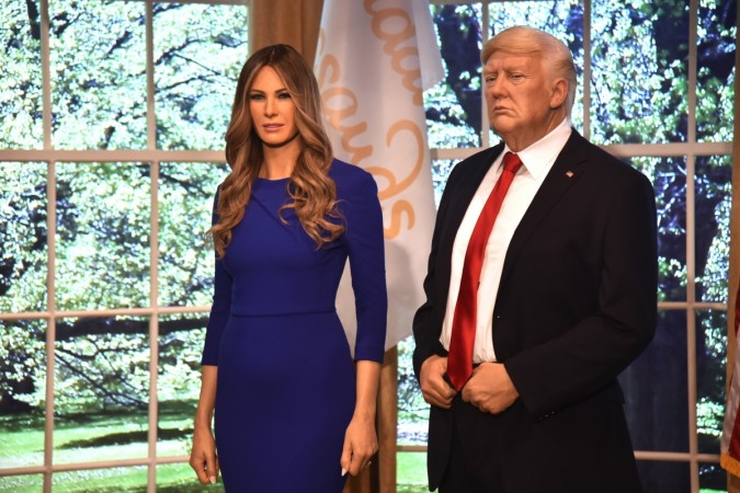A new wax figure of the US First Lady, Melania Trump, flanking a figure of US President Donald Trump, at the Madame Tussauds in New York City on April 25, 2018 Melania Trump