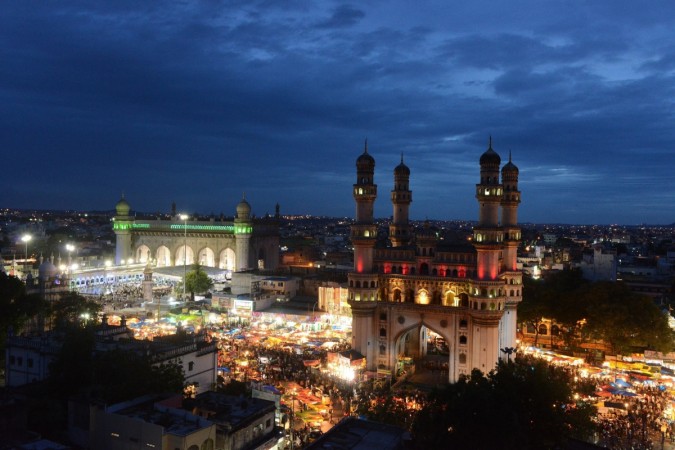 A view of the Indian historical monuments Mecca Masjid (L) and Charminar (R) are pictured at dusk in the old city section of Hyderabad Hyderabad