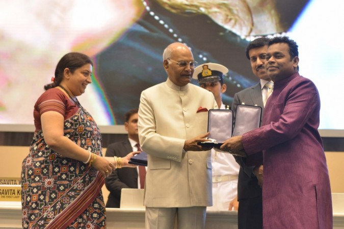 President Ram Nath Kovind presents the Rajat Kamal Award to music composer A.R. Rahman who won two honours -- music direction award for Tamil film 65th National Film Awards