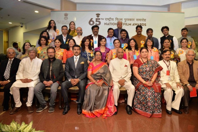 President Ram Nath Kovind, Union Ministers Smriti Irani and Rajyavardhan Singh Rathore with the winners of awards at the 65th National Film Awards ceremony, in New Delhi on May 3, 2018. 65th National Film Awards