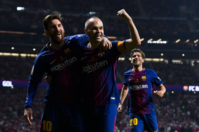 File photo of Lionel Messi and Andres class= Lionel Messi and Andres Iniesta
