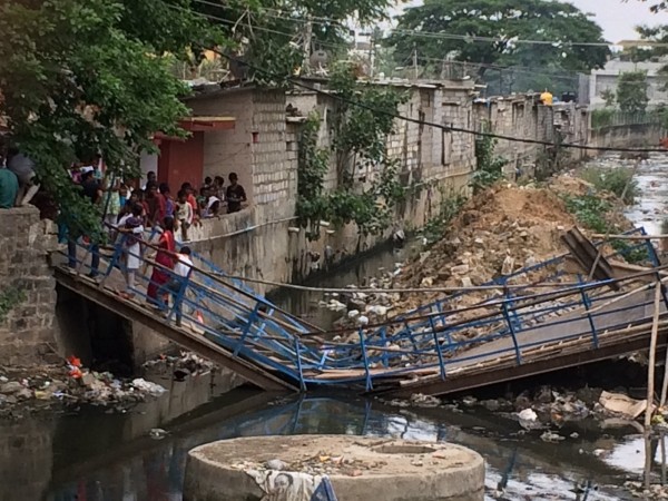 Bridge collapses in Shantinagar during MLA NA Harris's campaign rally. Bridge collapsed in Shantinagar, while MLA NA Harris was campaigning