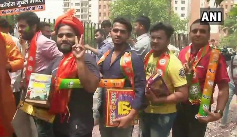 BJP celebrating in Delhi. KARNATAKA ASSEMBLY ELECTIONS
