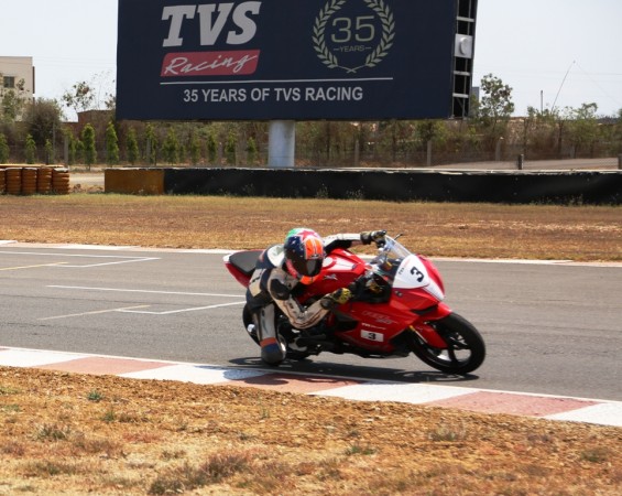 A rider astride race-spec TVS Apache RR 310 TVS Apache RR one make series