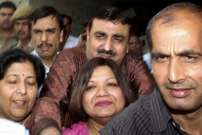 Madhuri Gupta (centre in pink) has been convicted of passing classified information to Pakistani intelligence agencies Madhuri Gupta