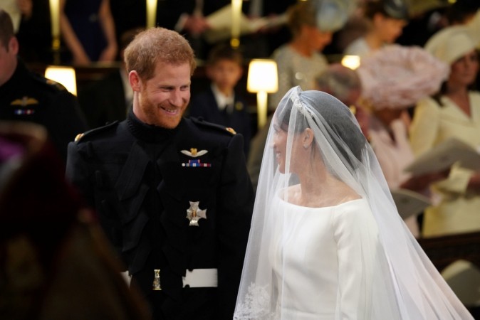 Prince Harry looks at his bride, Meghan Markle. Prince Harry Meghan Markle Royal wedding photos