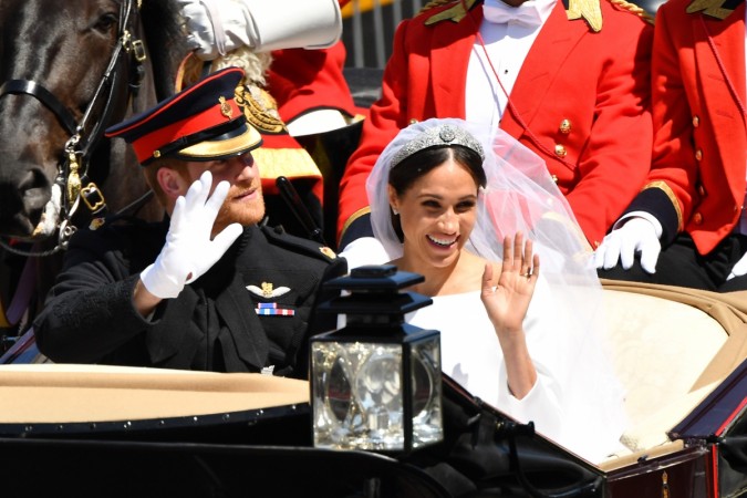 Prince Harry, Duke of Sussex and Meghan, Duchess of Sussex leave Windsor Castle in the Ascot Landau carriage during a procession after getting married at St Georges Chapel on May 19, 2018 in Windsor, England. Prince Henry Charles Albert David of Wales marries Ms. Meghan Markle in a service at St George's Chapel inside the grounds of Windsor Castle. Prince Harry Meghan Markle Royal wedding photos