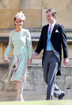 Pippa Middleton and James Matthews arrive at the wedding of Prince Harry to Ms Meghan Markle at St George's Chapel, Windsor Castle on May 19, 2018 in Windsor, England. Pippa Middleton and James Matthews
