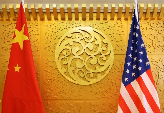 Chinese and U.S. flags are set up for a meeting during a visit by U.S. Secretary of Transportation Elaine Chao at China's Ministry of Transport in Beijing, China April 27, 2018. Picture taken April 27, 2018. China and US flags