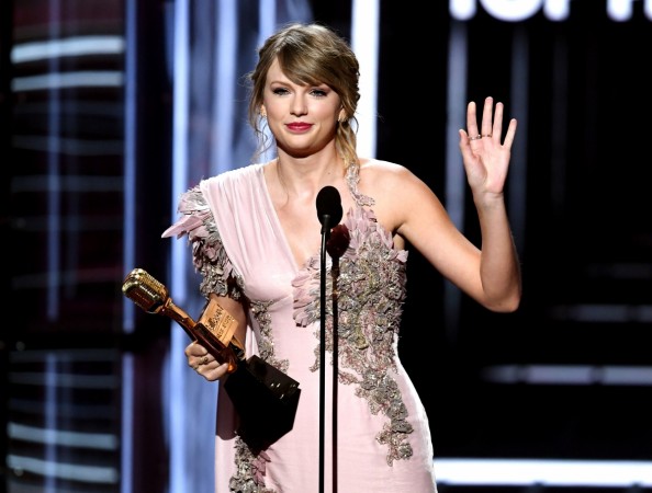 Recording artist Taylor Swift accepts the Top Female Artist award onstage during the 2018 Billboard Music Awards at MGM Grand Garden Arena on May 20, 2018 in Las Vegas, Nevada Recording artist Taylor Swift