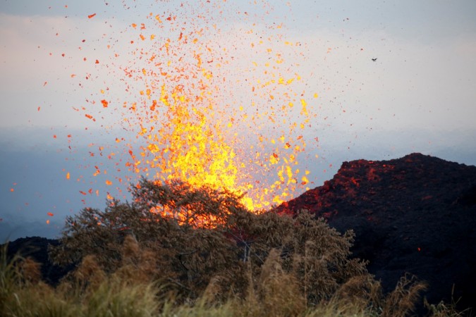 Lava erupts on the outskirts of Pahoa during ongoing eruptions of the Kilauea Volcano in Hawaii, U.S., May 19, 2018. Hawaii volcano