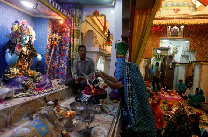The construction work would begin soon, during which the idols would be kept in the main room and sealed. In picture: A Hindu devotee pours milk over a Shivling (a symbol of Lord Shiva) while performing a ritual Temples in Pakistan