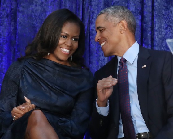 Former U.S. President Barack Obama and first lady Michelle Obama participate in the unveiling of their official portraits during a ceremony at the Smithsonian's National Portrait Gallery, on February 12, 2018 in Washington, DC Former U.S. President Barack Obama and first lady Michelle Obama