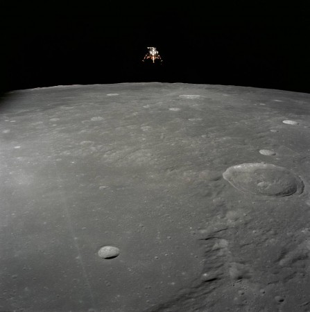 The Apollo 12 Lunar Module (LM), in a lunar landing configuration, is photographed in lunar orbit from the Command and Service Modules (CSM) on Nov. 19, 1969 Apollo 12