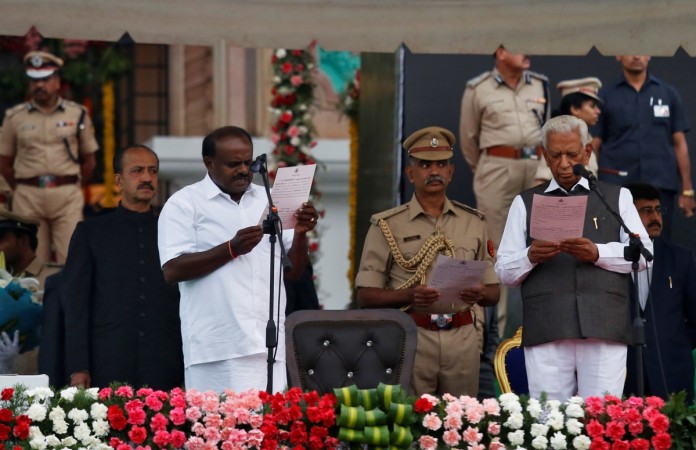Congress-JD(S) combine agrees on letting Kumaraswamy be the Karnartaka CM for 5 years. (Photo: Kumaraswamy taking oath on May 23, 2018) HD Kumaraswamy swearing-in ceremony