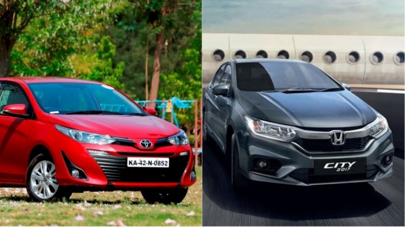 Toyota Yaris (red) vs Honda City (silver) Toyota Yaris vs Honda City