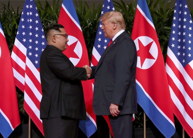 U.S. President Donald Trump shakes hands with North Korean leader Kim Jong Un at the Capella Hotel Donald Trump Kim Jong Un