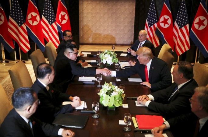 U.S. President Donald Trump shakes hands with North Korea's leader Kim Jong Un before their expanded bilateral meeting at the Capella Hotel on Sentosa island in Singapore June 12 Donald Trump Kim Jong Un