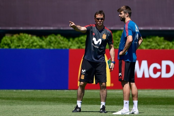 Julen Lopetegui and Gerard Pique have a conversation during a Spain training session Julen Lopetegui Gerard Pique Spain
