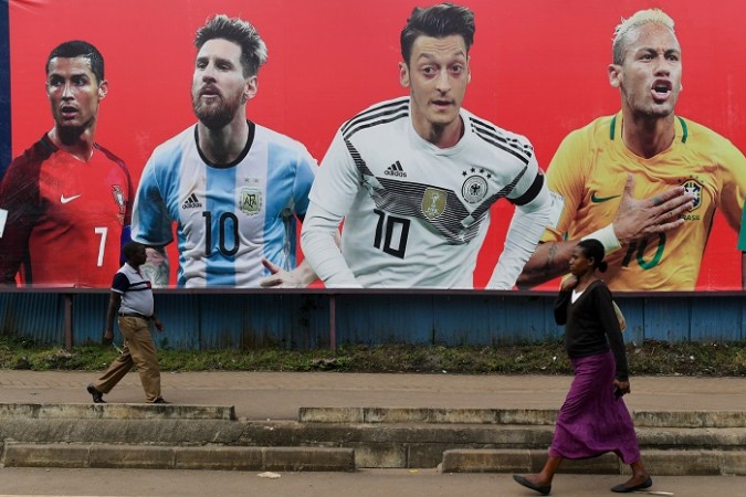 Cristiano Ronaldo (L), Mezut Ozil (2nd R) and Neymar (R) could all challenge Lionel Messi for the Golden Ball Cristiano Ronaldo Lionel Messi Mesut Ozil Neymar
