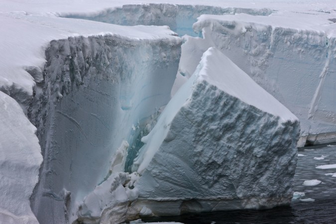This is ice calving off an ice shelf in the Antarctic Calving Ice