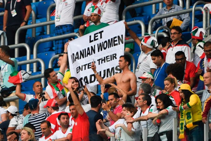 Several Iran football fans held up banners protesting for women during a Fifa World Cup match in St. Petersburg Iran football fans