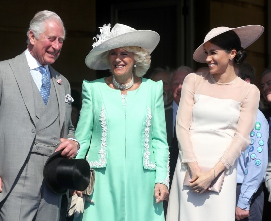 Prince Charles, Prince of Wales, Camilla, Duchess of Cornwall and Meghan, Duchess of Sussex attend The Prince of Wales' 70th Birthday Patronage Celebration held at Buckingham Palace on May 22, 2018 in London, England. Meghan Markle Prince Charles