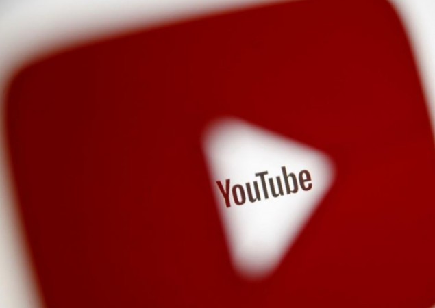 A 3D-printed YouTube icon is seen in front of a displayed YouTube logo in this illustration taken October 25, 2017. YouTube Music expands to 12 more countries
