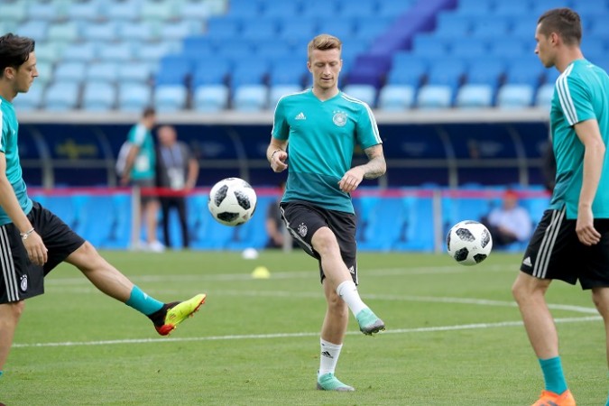 Marco Reus (C) is set to replace Julian Draxler (R), while Mesut Ozil is expected to keep his place in the starting XI for Germany Mesut Ozil Marco Reus Julian Draxler Germany