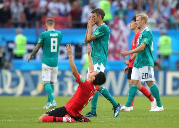 Thomas Muller and the rest of the Germany players react after their scarcely believable defeat to South Korea Thomas Muller Germany South Korea