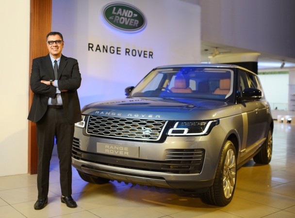 Rohit Suri, President & Managing Director, Jaguar Land Rover India with 2018 Range Rover 2018 Range Rover