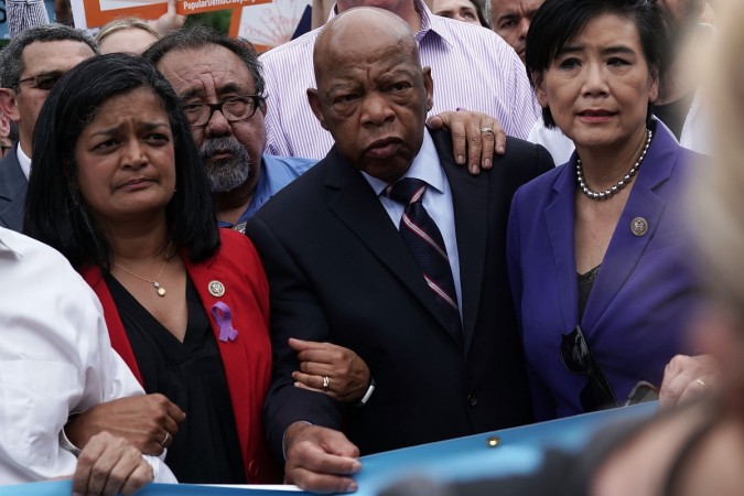 U.S. Rep. Pramila Jayapal (D-WA), Rep. Raul Grijalva (D-AZ), Rep. John Lewis (D-GA), and Rep. Judy Chu (D-CA) march to the headquarters of U.S. Customs and Border Protection during a protest June 13, 2018 in Washington, DC. Activists Protest Trump Policy Of Separating Immigrant Children And Families