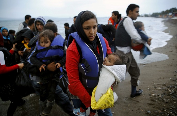Afghan immigrants land at a beach on the Greek island of Kos Afghan immigrants land at a beach on the Greek island of Kos