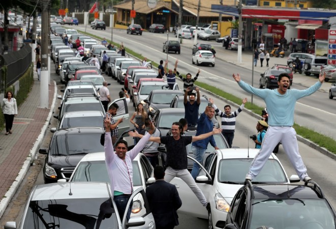 Uber drivers protest against a legislation threatening the company's business model that is to be voted in Brazil's national congress, in Sao Paulo Uber drivers protest in Brazil