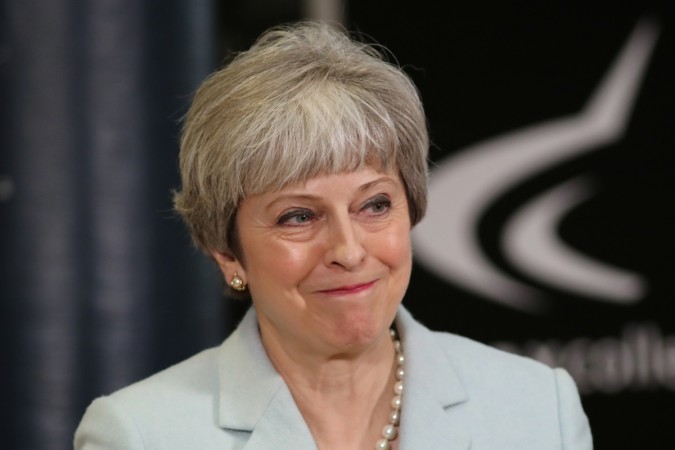 Britain's Prime Minister Theresa May leaves after delivering a speech to students and staff during her visit to Derby College in Derby, Britain, February 19, 2018. Theresa May