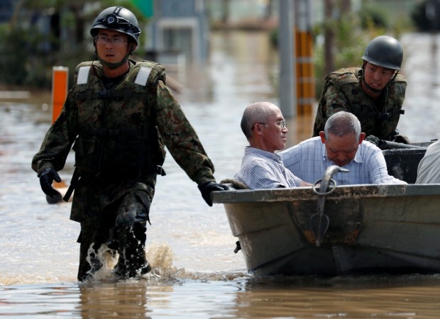 Japan Self-Defense Force soldiers rescue people from a flooded area in Mabi town in Kurashiki, Okayama Prefecture, Japan, July 8, 2018. Japan floods