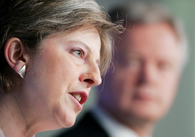 Britain's Conservative party Shadow Home Secretary David Davis (R) and Shadow Secretary of State for the Family Theresa May (L) address a news conference on crime, in central London, April 22, 2005. Theresay May and David Davis