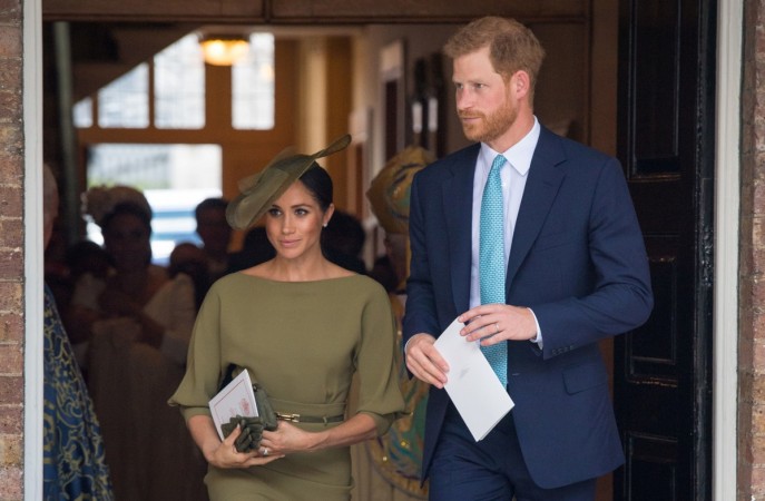 Britain's Prince Harry and Meghan, the Duchess of Sussex, leave the chapel after the christening of Prince Louis at the Chapel Royal, St James's Palace, London, Britain, July 9, 2018. Meghan Markle