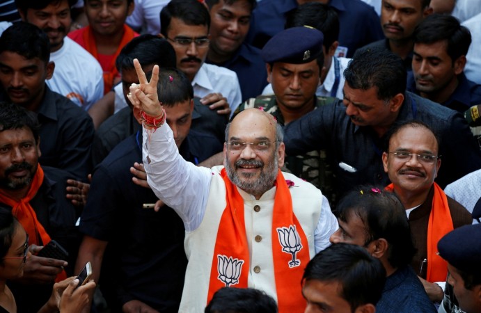 Amit Shah, President of India's ruling Bharatiya Janata Party (BJP), gestures as he begins a door-to-door campaign for the 2017 Gujarat elections. Amit Shah
