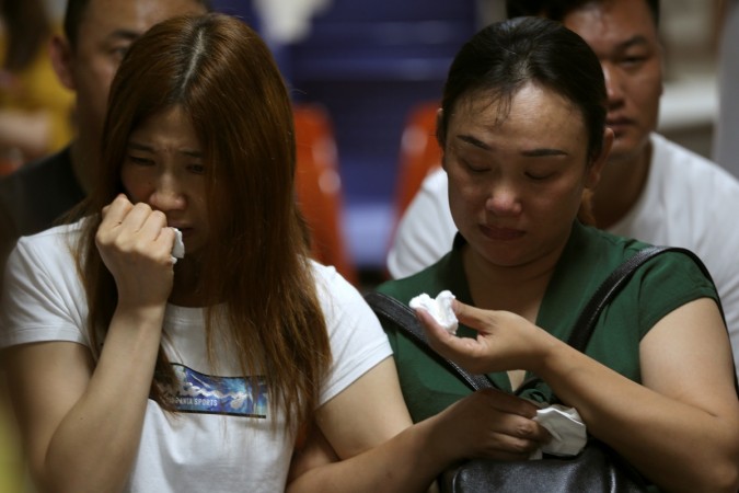 Relatives of Chinese tourists involved in a sunken tourist boat accident, cry at a hospital in Phuket, Thailand Relatives of Chinese tourists involved in a sunken tourist boat accident