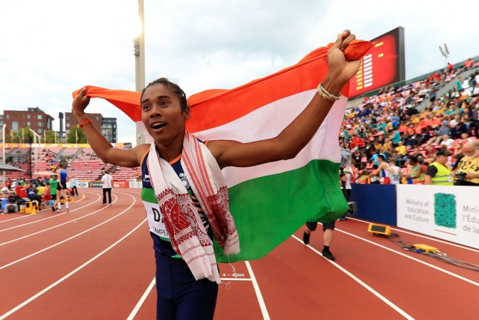 Hima Das celebrates after the historic gold on Thursday. Hima Das