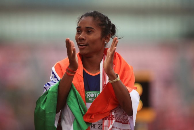Hima Das celebrates after winning the women's 400m at IAAF U20 Championships in Finland on July 12. Hima Das