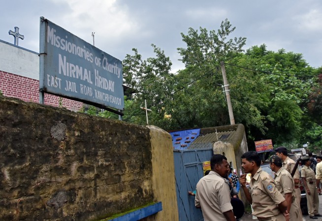 Police stand outside a home which provides shelter for pregnant unmarried women run by the Missionaries of Charity, a Roman Catholic order founded by Mother Teresa, in Ranchi, India, July 4, 2018. Picture taken July 4, 2018. Nirmal Hriday shelter in Ranchi