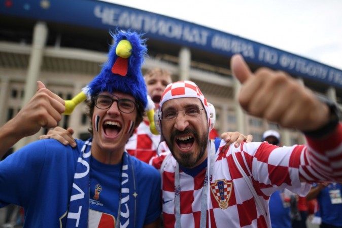 A French fan and his Croatian counterpart in Moscow ahead of the World Cup final. Croatia and France fans at Fifa World Cup