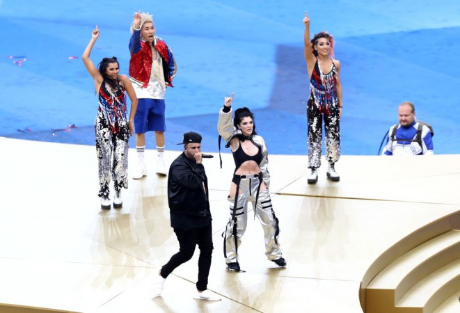 Nicky Jam and Era Estrefi perform at the closing ceremony of Fifa World Cup. Nicky Jam and Era Estrefi